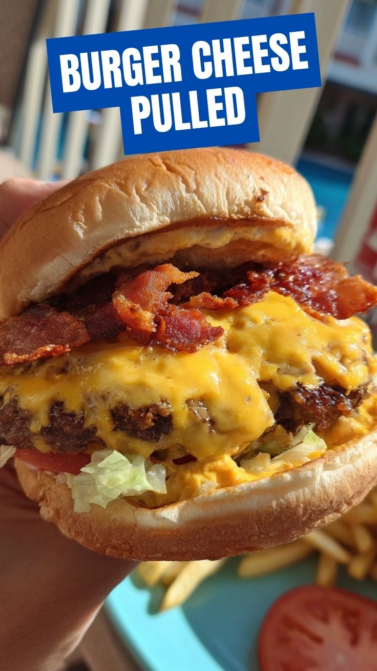A freshly prepared cheeseburger with a thick patty and melted cheese