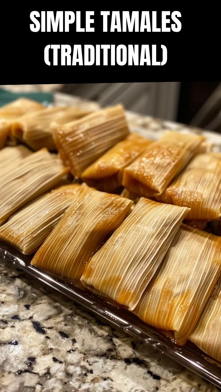 Several traditional tamales, some unwrapped to show the masa filling, on a rustic serving dish.