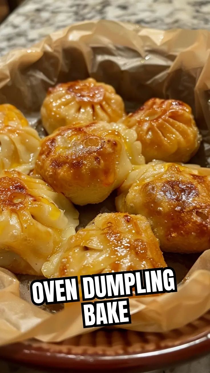 A golden-brown dumpling bake in a ceramic casserole dish