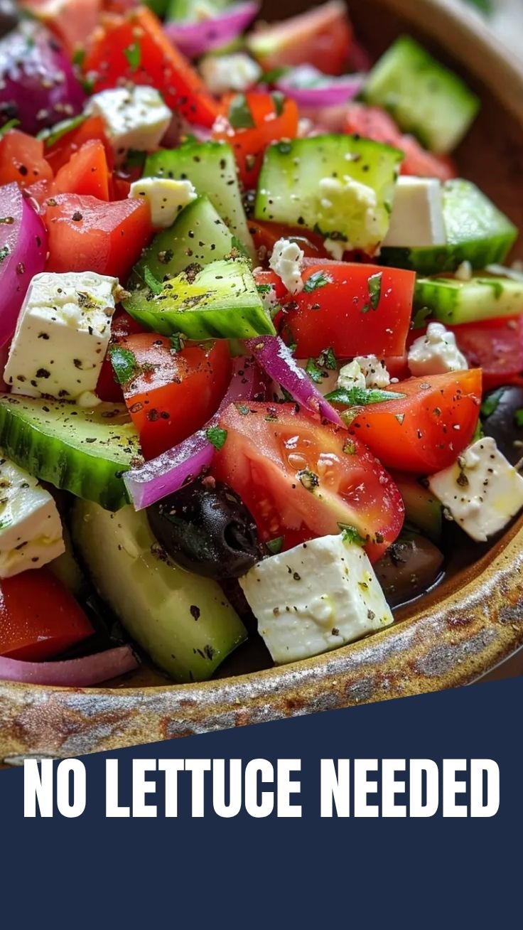A bowl of fresh Greek salad with feta cheese, olives, and crisp vegetables
