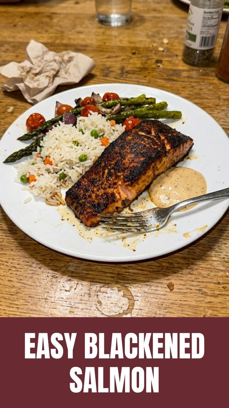A perfectly cooked blackened salmon fillet with a crispy crust