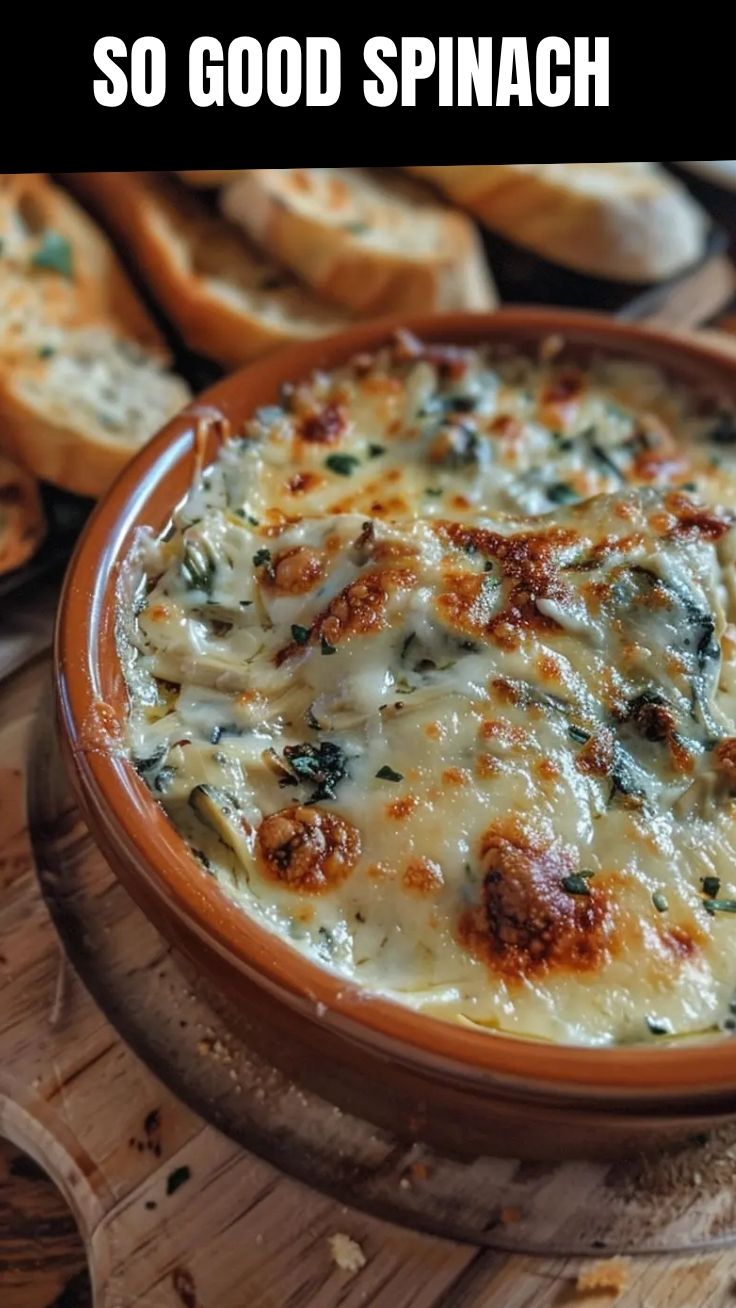 A hot and bubbly spinach artichoke dip, freshly baked and ready to serve.