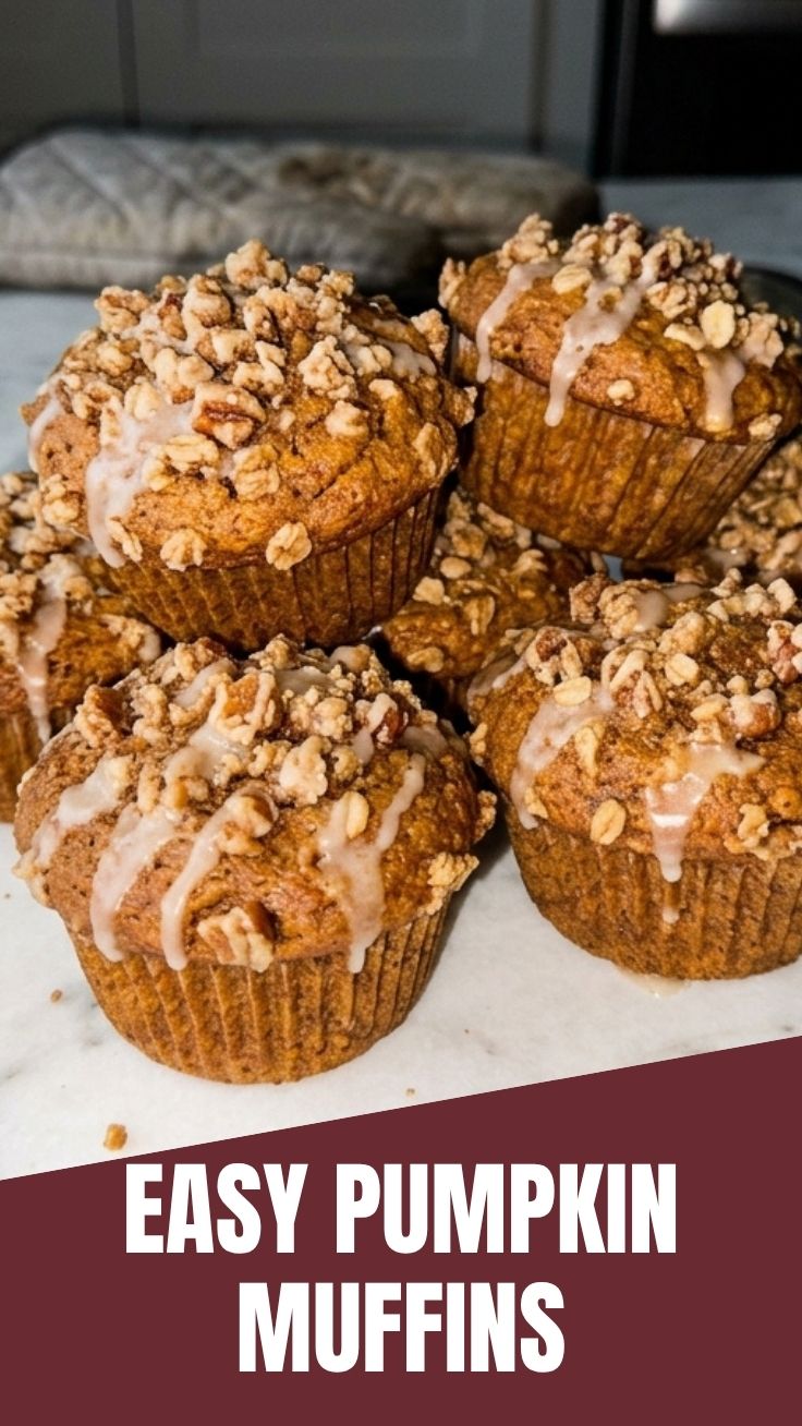 Freshly baked pumpkin muffins cooling on a wire rack